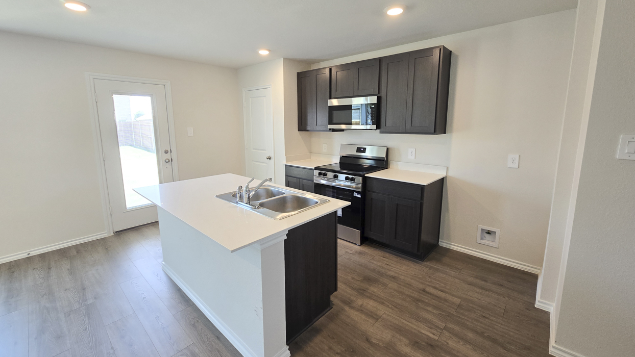Davis Floorplan Elevation B Kitchen Gallery Image - Creekside Ranch in Blue Ridge, TX