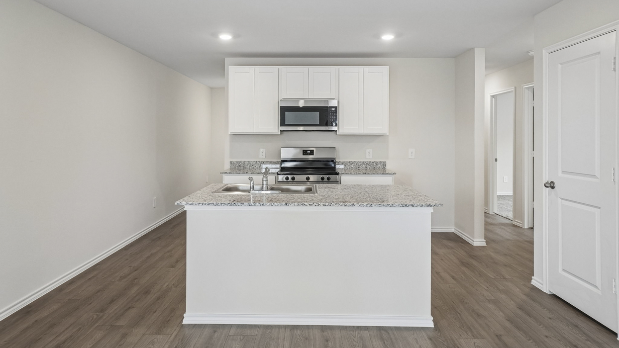 Estero Floorplan Elevation E Kitchen Gallery Image - Creekside Ranch in Blue Ridge, TX