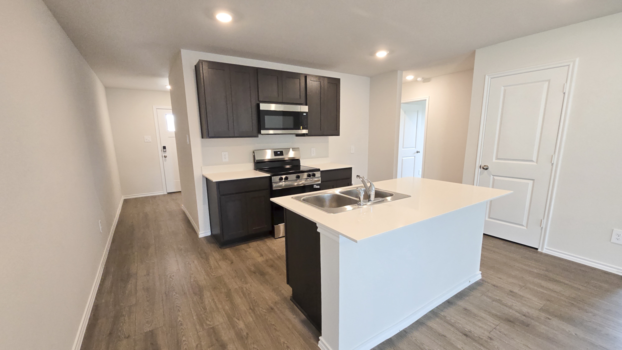 Estero Floorplan Elevation F Kitchen Gallery Image - Creekside Ranch in Blue Ridge, TX