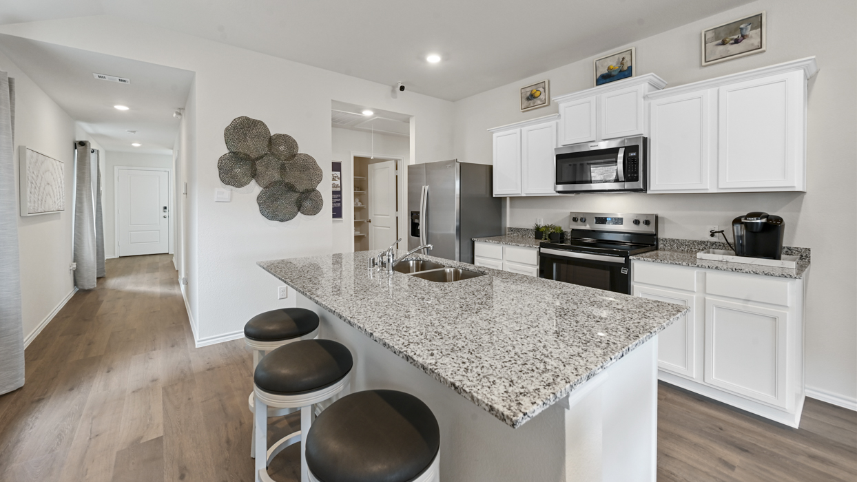 Caroline Floorplan Elevation F Kitchen Gallery Image - Creekside Ranch in Blue Ridge, TX