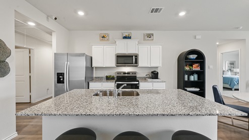 X30C Caroline Floorplan Elevation F Kitchen Gallery Image-Creekside Ranch in Blue Ridge, TX