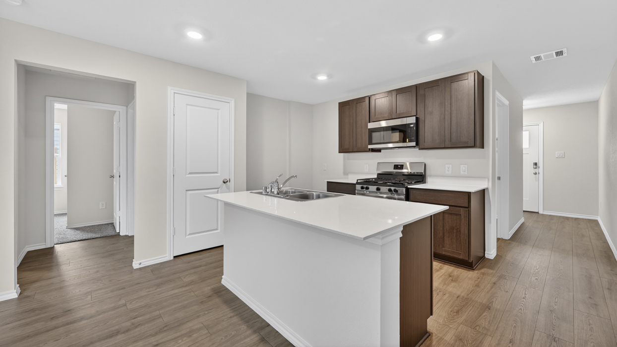 Caprock Floorplan Elevation S Kitchen Gallery Image - The Hills of Sherman in Sherman, TX