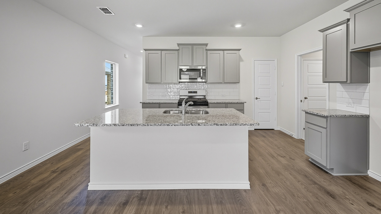 Finn Floorplan Elevation E/F Kitchen Gallery Image - Windchime in Celina, TX