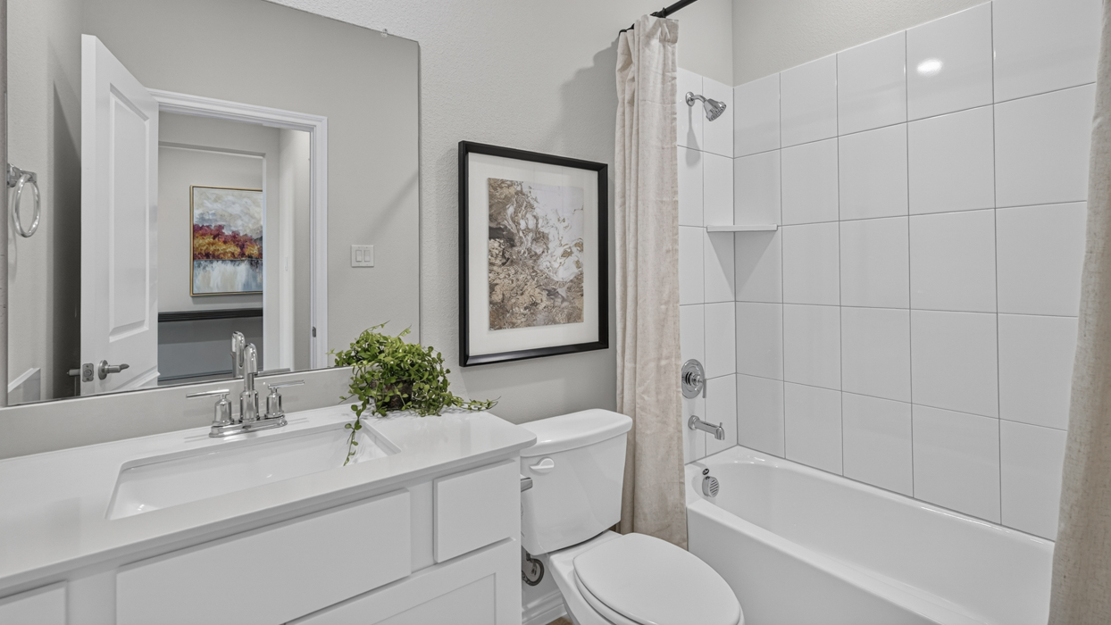 H235 Bastrop Floorplan Bathroom Gallery Image-Windchime in Celina, Tx