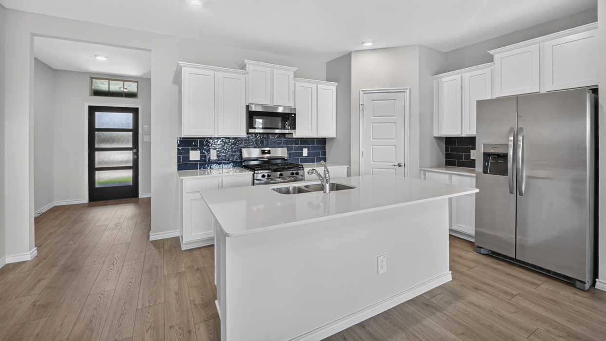 Copaiba Floorplan Elevation E Kitchen Gallery Image - The Hills of Sherman in Sherman, TX