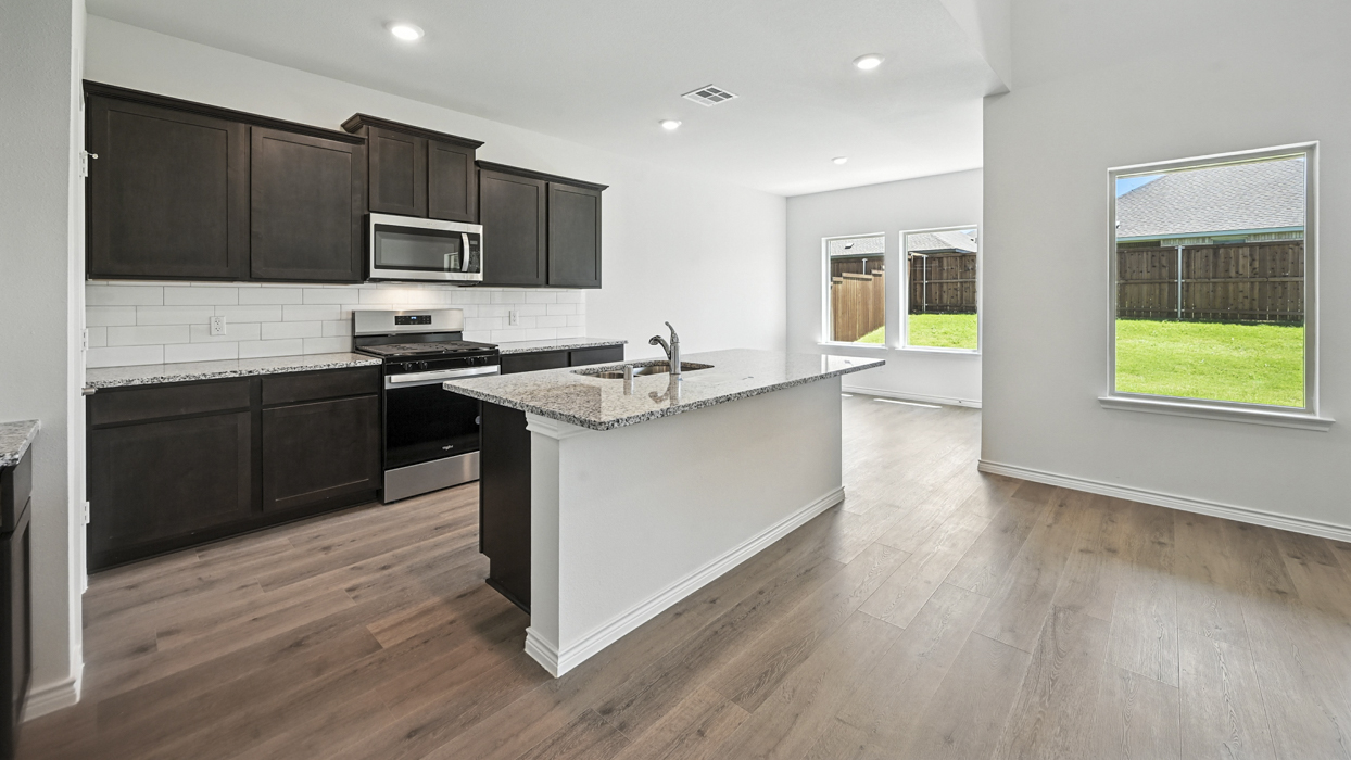 Tangerine Floorplan Elevation E/F Kitchen Gallery Image - Windchime in Celina, TX