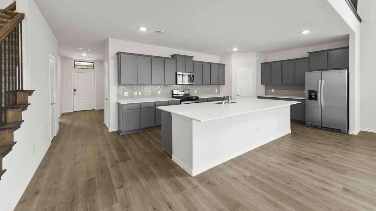 Bastrop Floorplan Elevation E Kitchen Gallery Image - Windchime in Celina, TX
