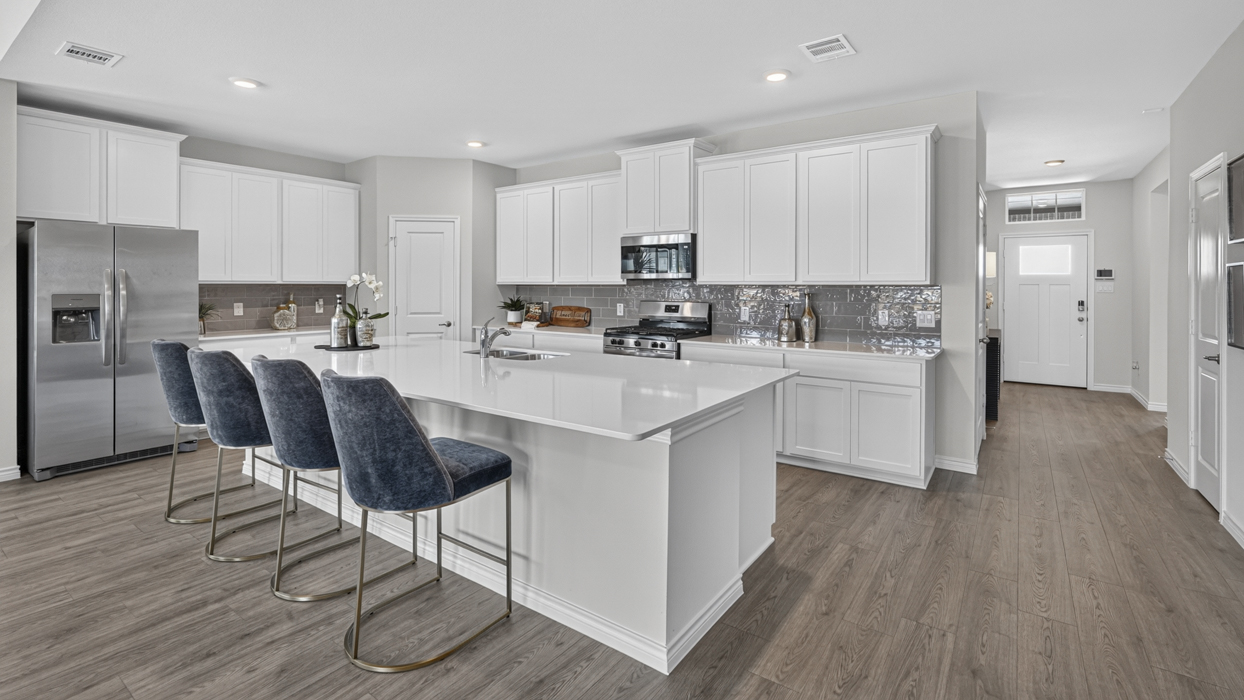 Bastrop Floorplan Elevation E/F Kitchen Gallery Image - Windchime in Celina, TX