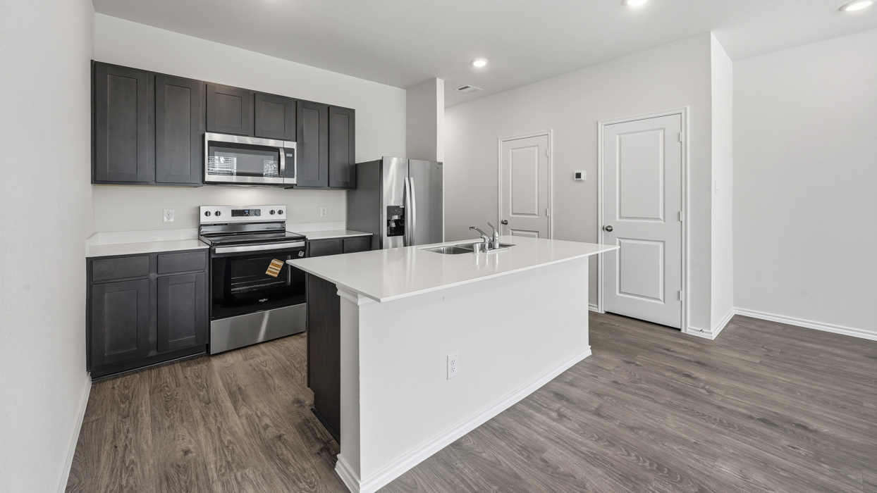 Argentina Floorplan Elevation B Kitchen Gallery Image - Arbor Trails South in Princeton, TX