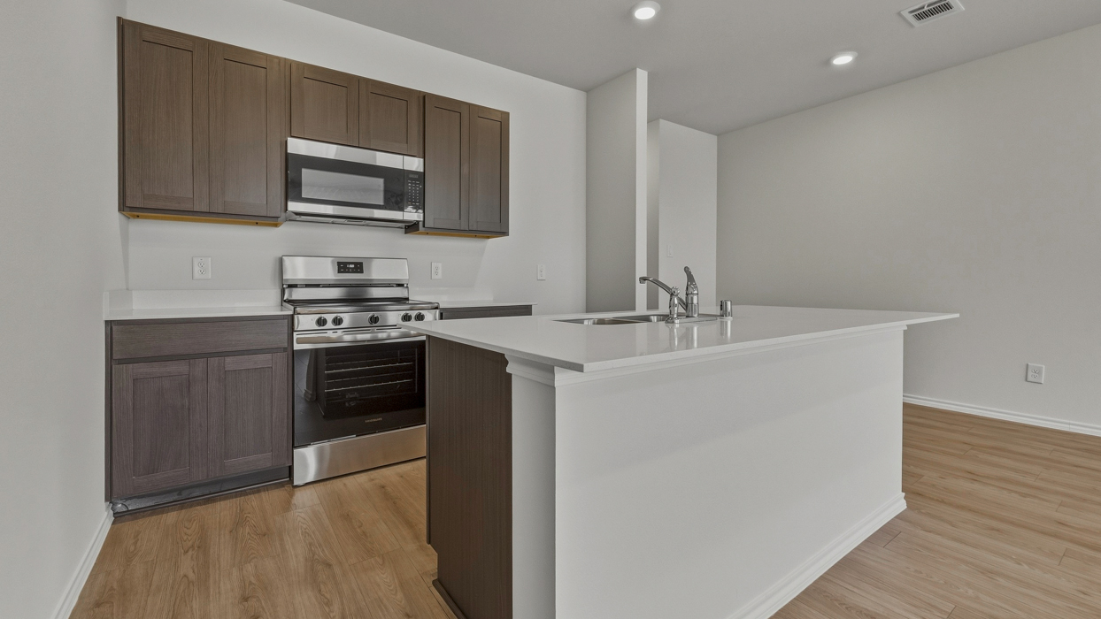 Santiago Floorplan Elevation B Kitchen Gallery Image - Arbor Trails South in Princeton, TX