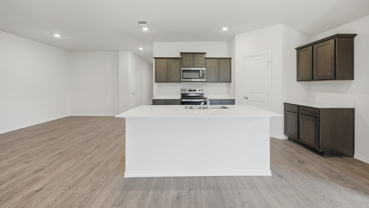 Lakeway Floorplan Elevation A Kitchen Gallery Image - Sanger Circle in Sanger, TX