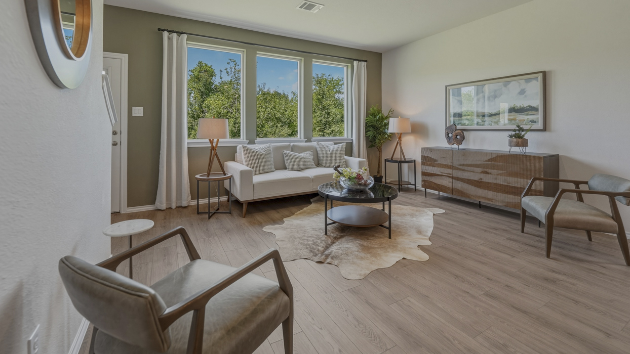 Chesapeake Floorplan Elevation B Living Room Gallery Image - Stonewood in Sulphur Springs, TX