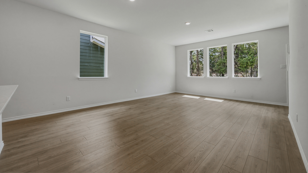 Chesapeake Floorplan Elevation B Living Room Gallery Image - Stonewood in Sulphur Springs, TX