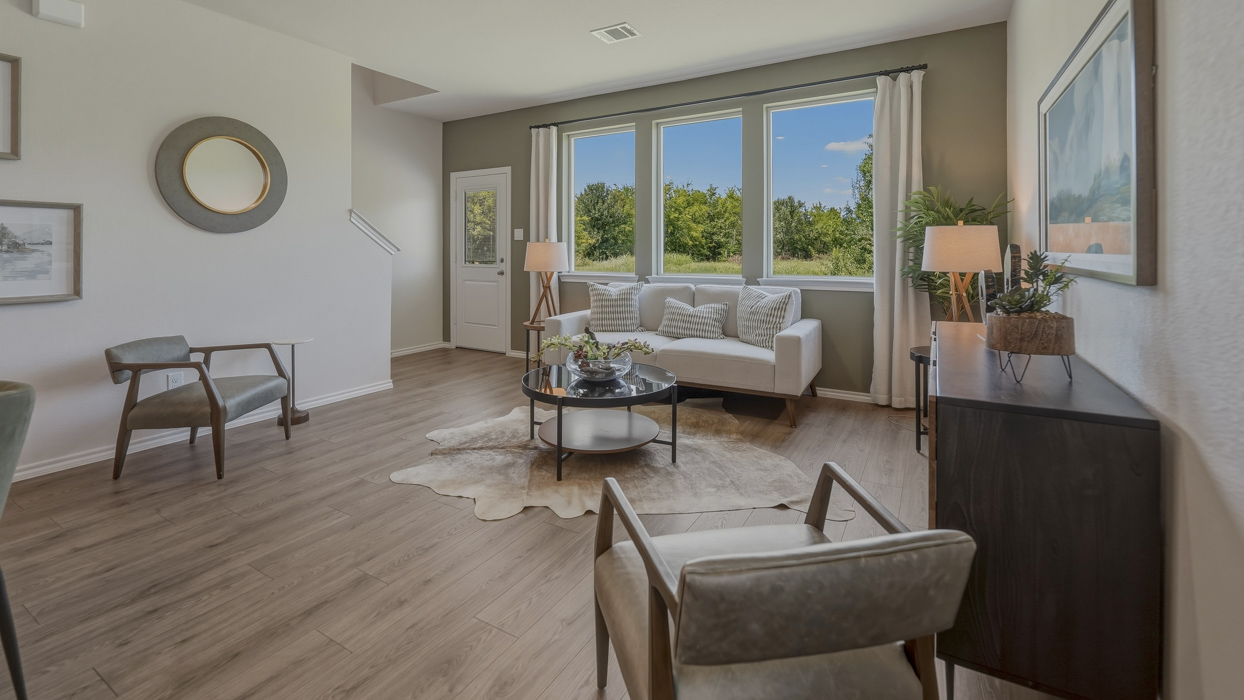 Chesapeake Floorplan Elevation B Living Room Gallery Image - Stonewood in Sulphur Springs, TX