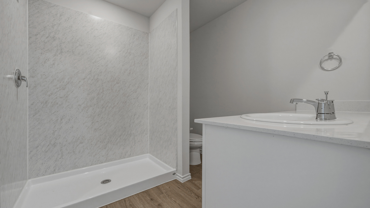 Chesapeake Floorplan Elevation B Bathroom Gallery Image - Stonewood in Sulphur Springs, TX