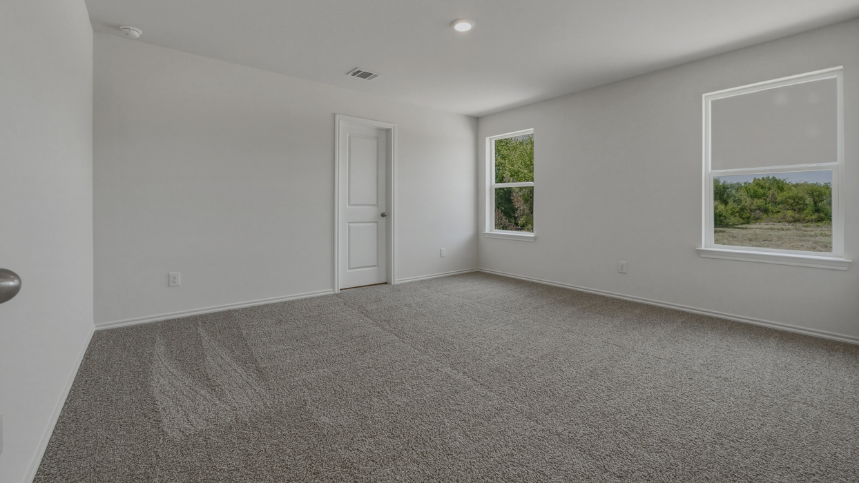 Chesapeake Floorplan Elevation B Bedroom Gallery Image - Stonewood in Sulphur Springs, TX
