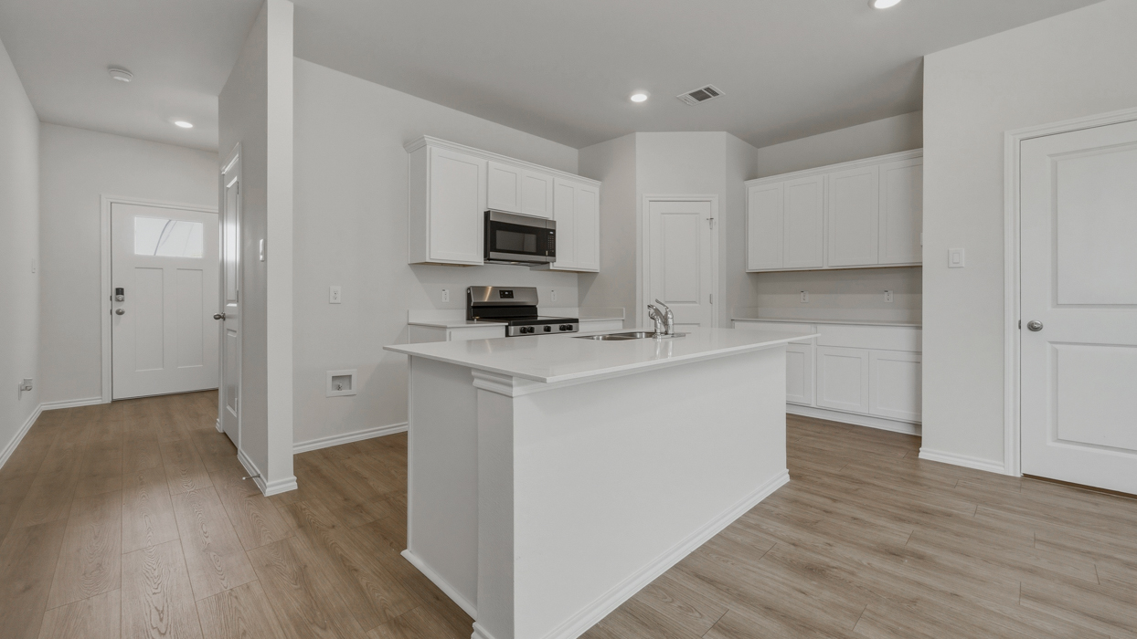 Chesapeake Floorplan Elevation B Kitchen Gallery Image - Stonewood in Sulphur Springs, TX