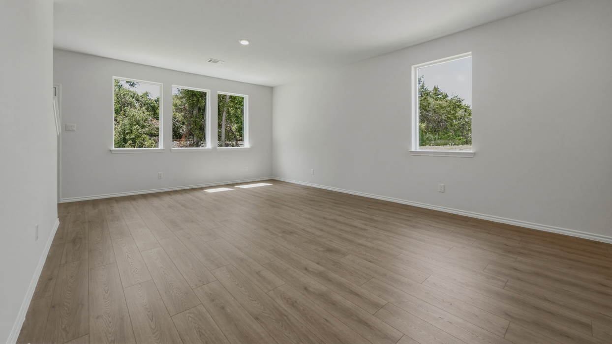 Chesapeake Floorplan Elevation B Living Room Gallery Image - Stonewood in Sulphur Springs, TX