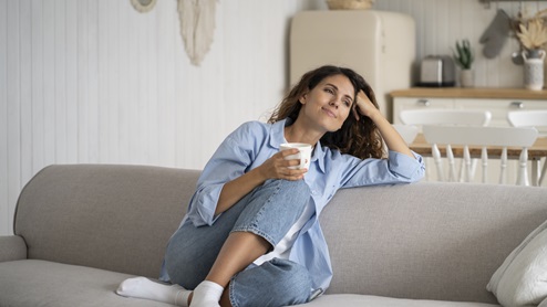 Thinking of new home on couch