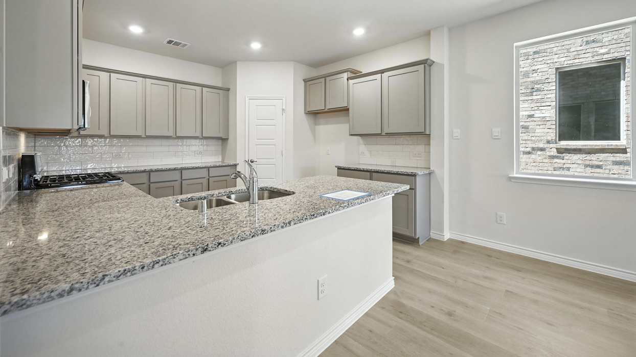 Tanzanite Floorplan Kitchen Gallery Image-Bel Air Village in Sherman, Tx