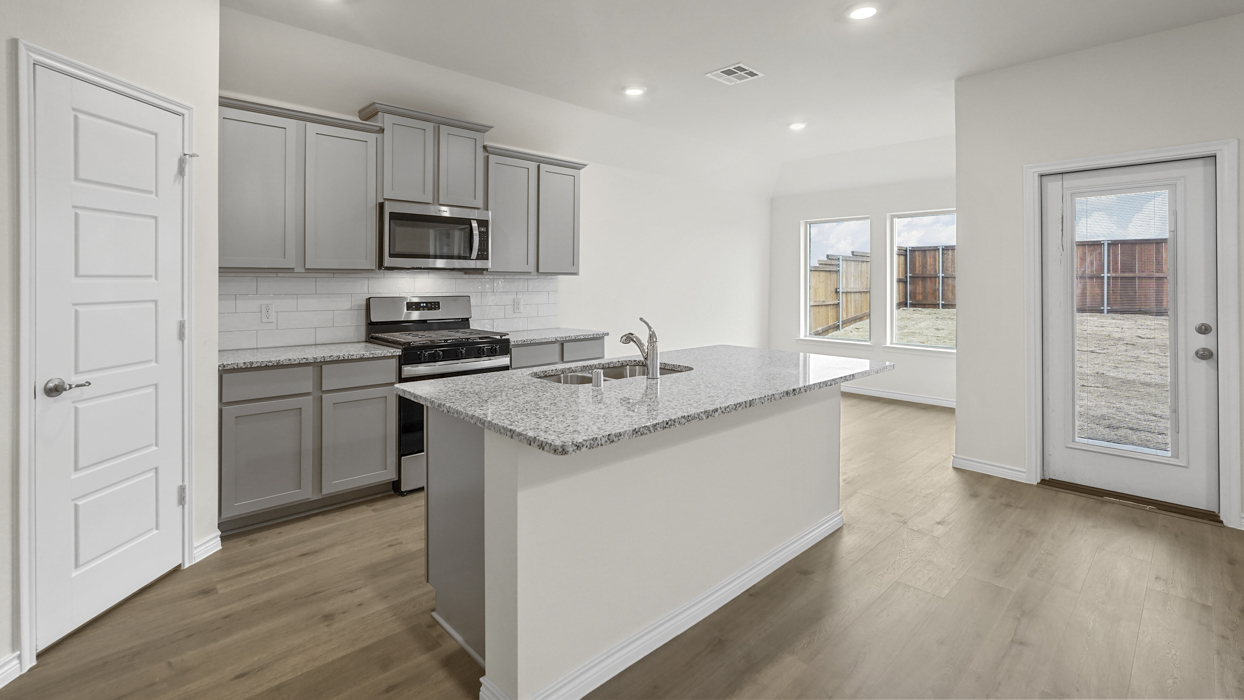 H143 Cedarwood Floorplan Kitchen Gallery Image-Bel Air Village in Sherman, Tx