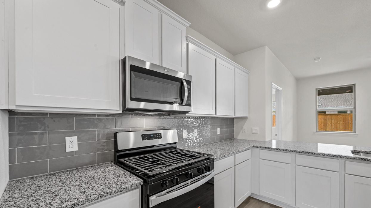 H204 Medbourne Floorplan Elevation B Kitchen Gallery Image-Bel Air Village in Sherman, TX