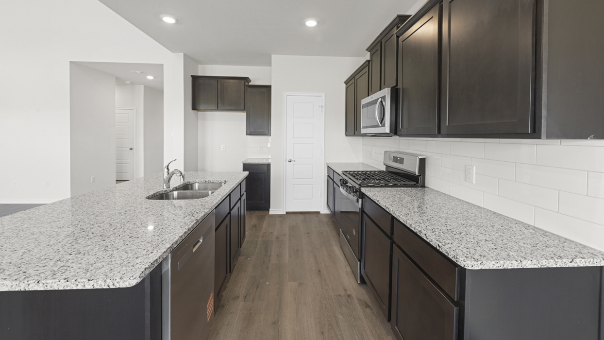 H232 Tangerine Floorplan Kitchen Gallery Image-Bel Air Village in Sherman, Tx