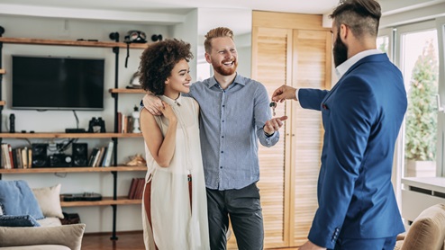 Couple getting keys to new home- Asher Oaks in Bonham, TX