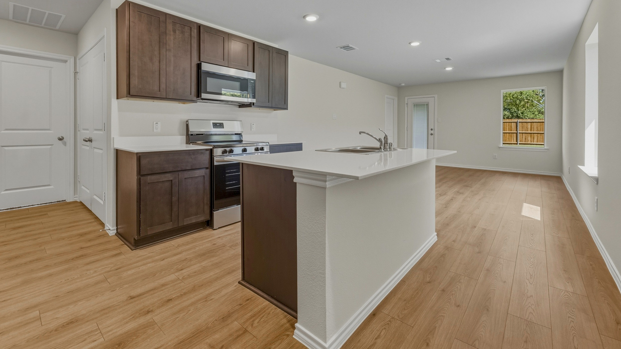 Atlanta Floorplan Elevation F Kitchen Gallery Image - Asher Oaks in Bonham, TX