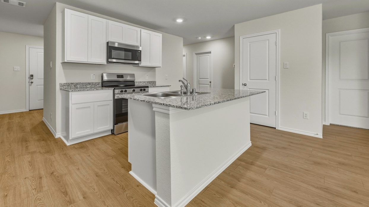 Estero Floorplan Kitchen Gallery Image  - Asher Oaks in Bonham, TX