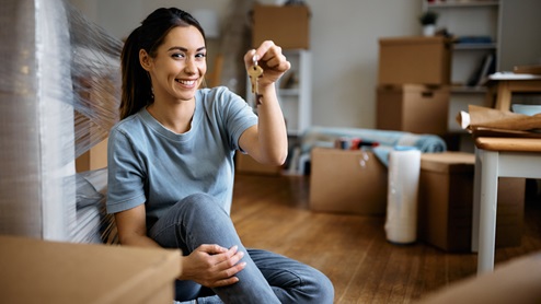 Woman with keys of new home-Asher Oaks in Bonham, TX
