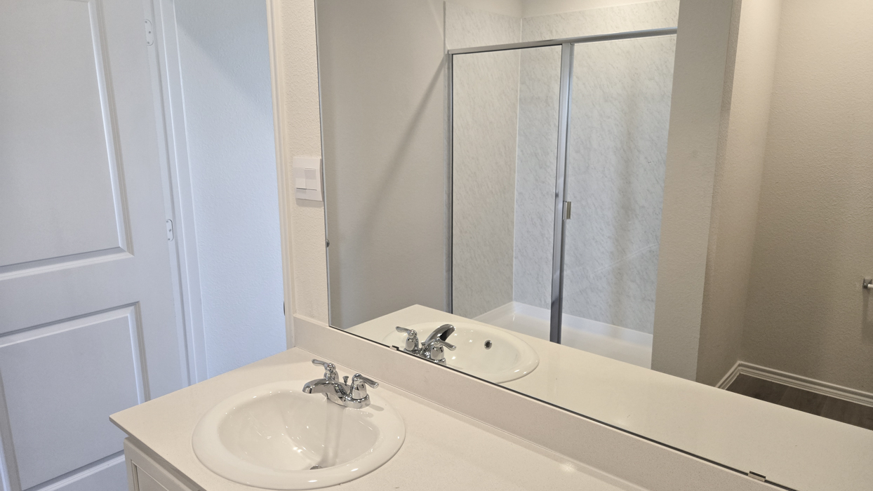 Amber Floorplan Elevation B Bathroom Gallery Image - Hanolley Hills in Sherman, TX