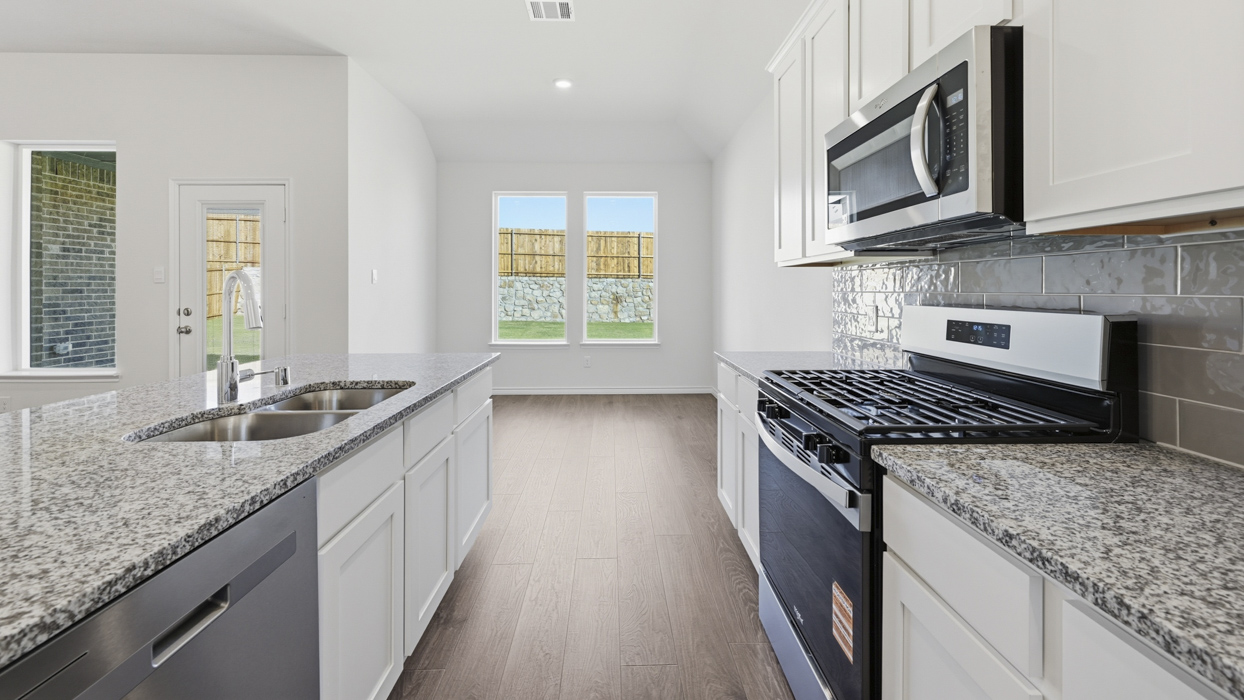 1829 Brookview Floorplan kitchen gallery image at Morning Ridge in Princeton TX