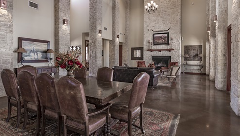 Interior of amenity center with lounge furniture and table