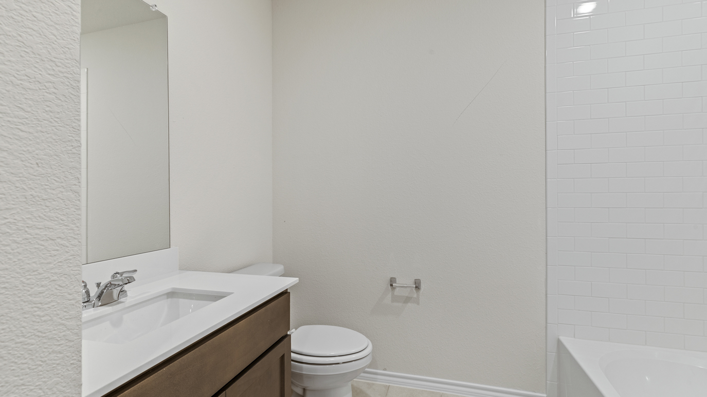 X40H Huntsville floorplan bathroom rendering at Stonewyck Farms in Ennis TX
