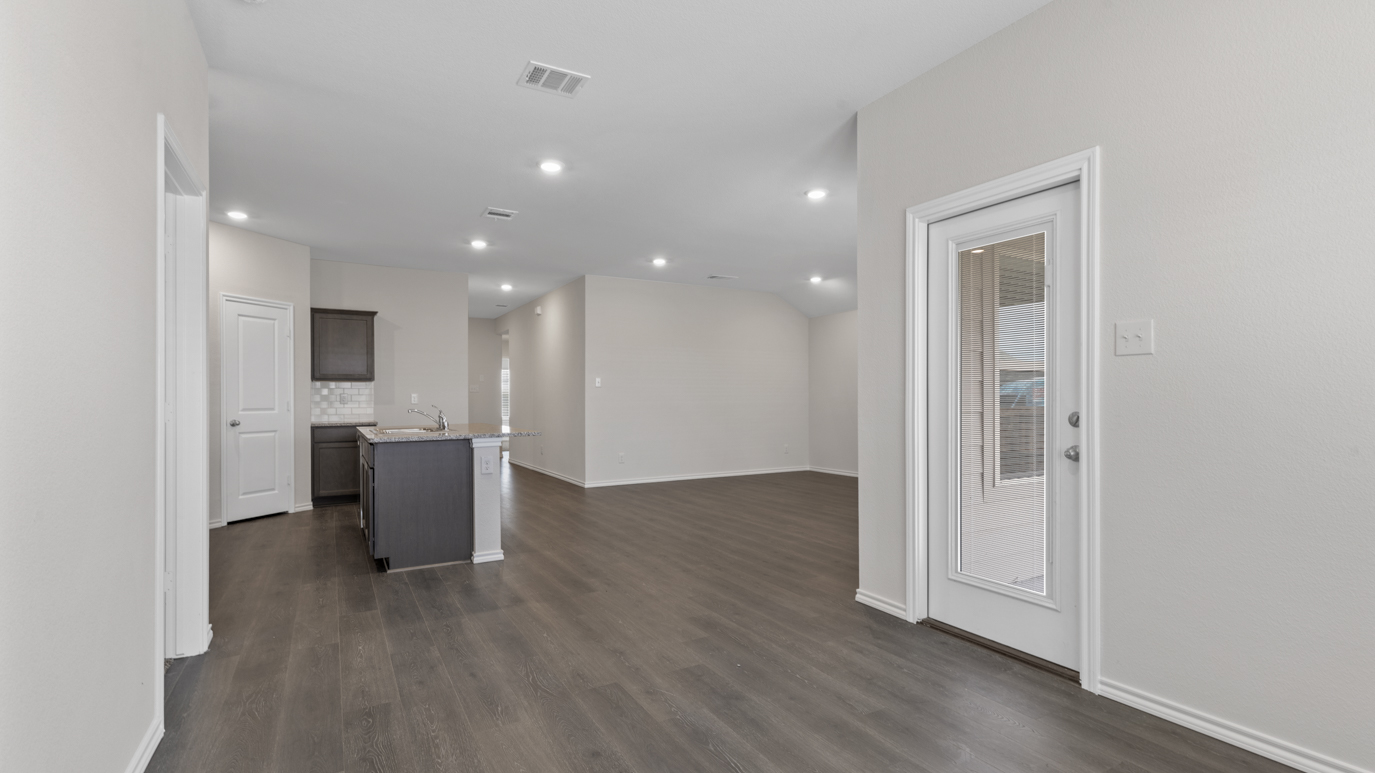 X40H Huntsville floorplan dining nook-kitchen rendering at Stonewyck Farms in Ennis TX