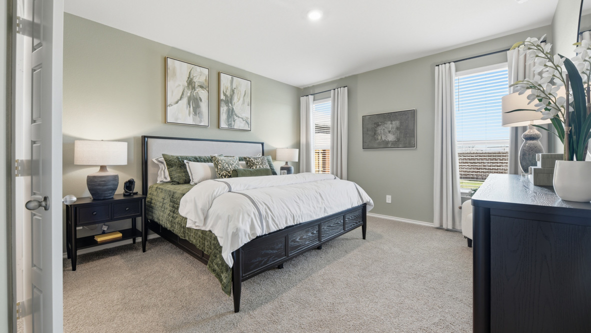 Bedroom 1 with double windows allowing natural light