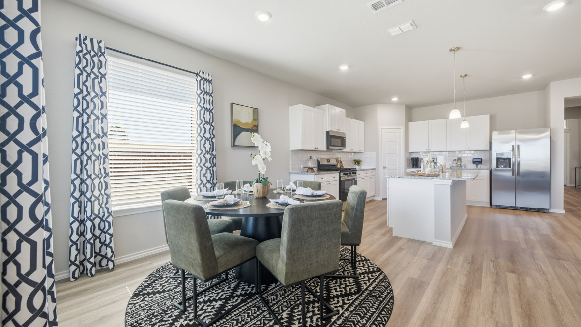 Open dining room space adjacent to kitchen