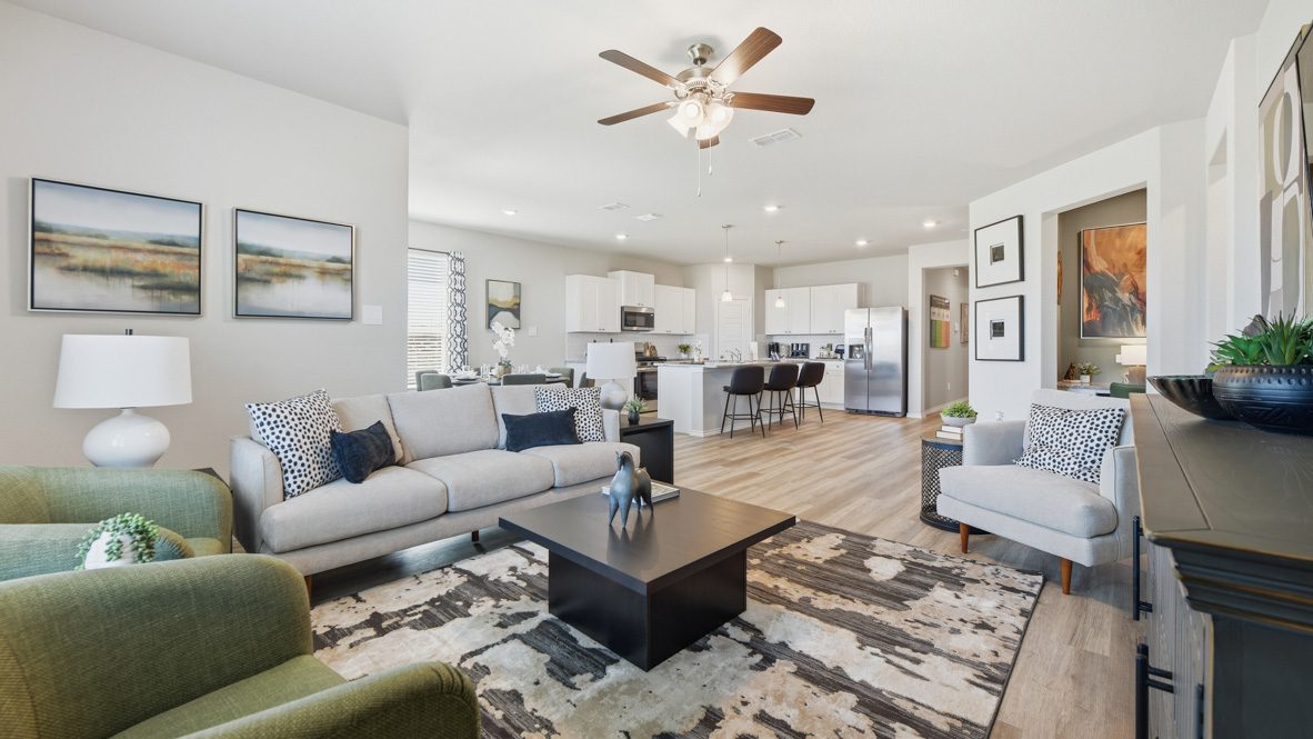 Open-concept living, dining, and kitchen space