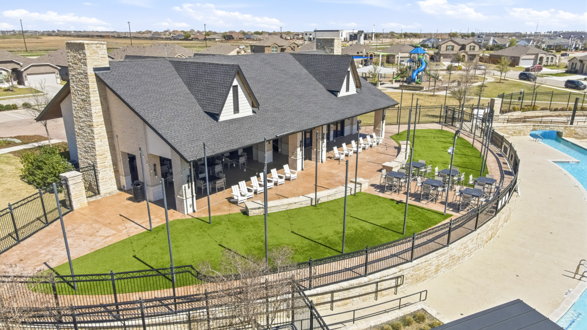 Community clubhouse with outdoor seating area and collaborative space