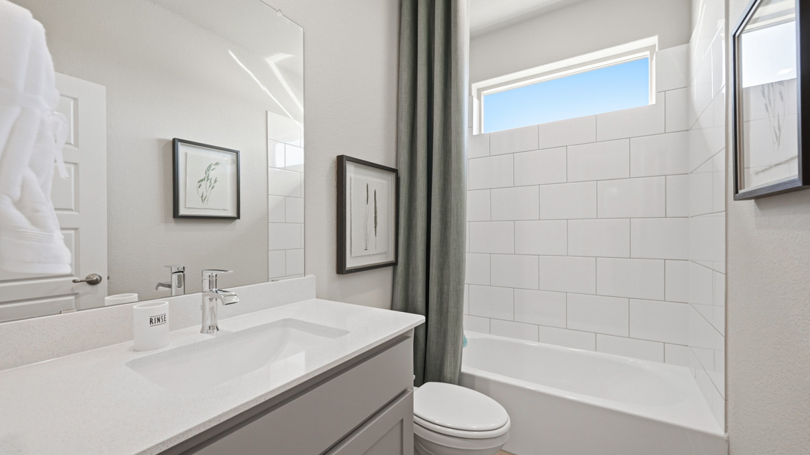 Bathroom 2 in between remaining bedrooms and within hallway