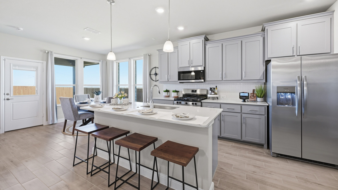 Open-concept kitchen with spacious island for everyday entertaining and enjoyment