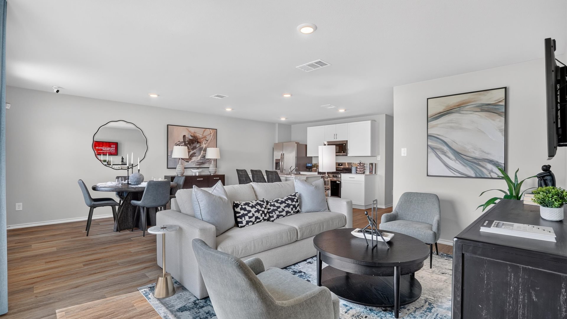Open kitchen, dining, and living