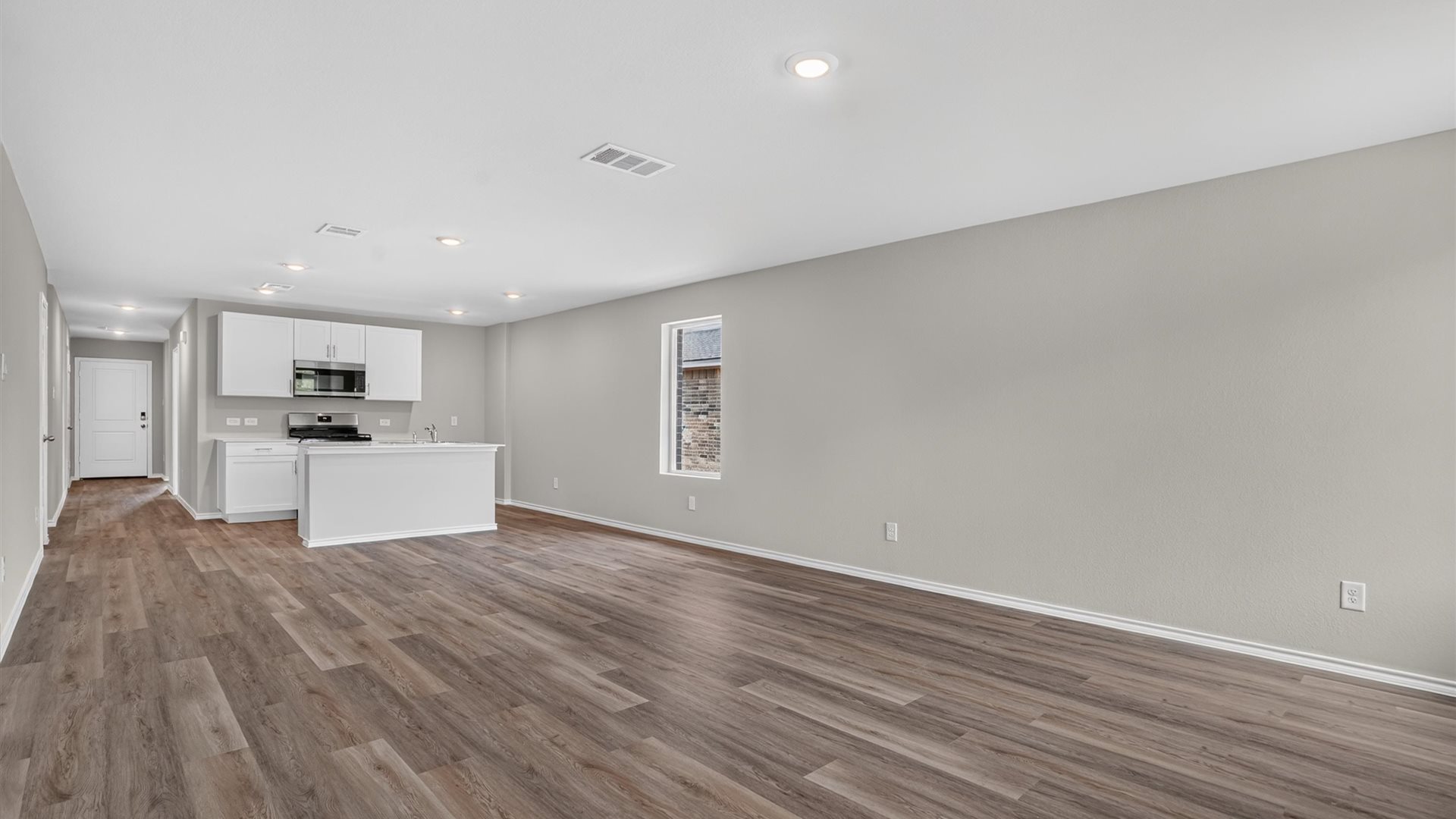 Spacious kitchen, dining, and living space