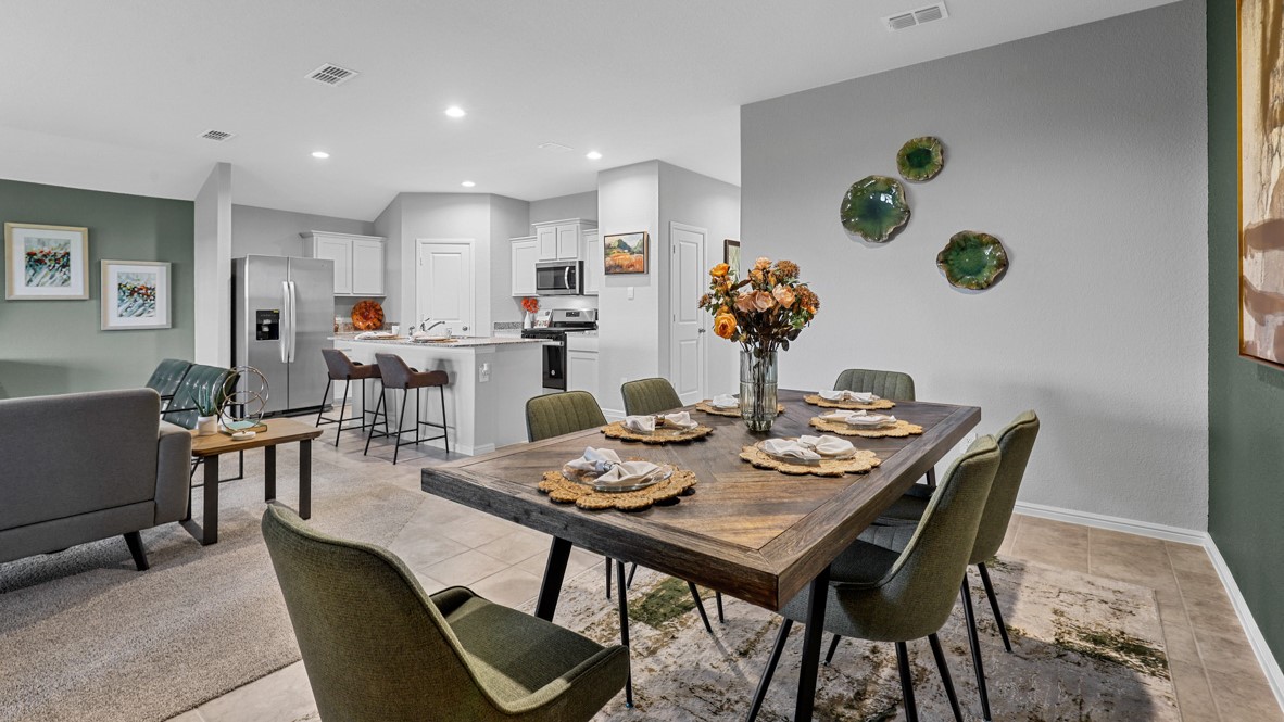 Dining area overlooking living room and kitchen