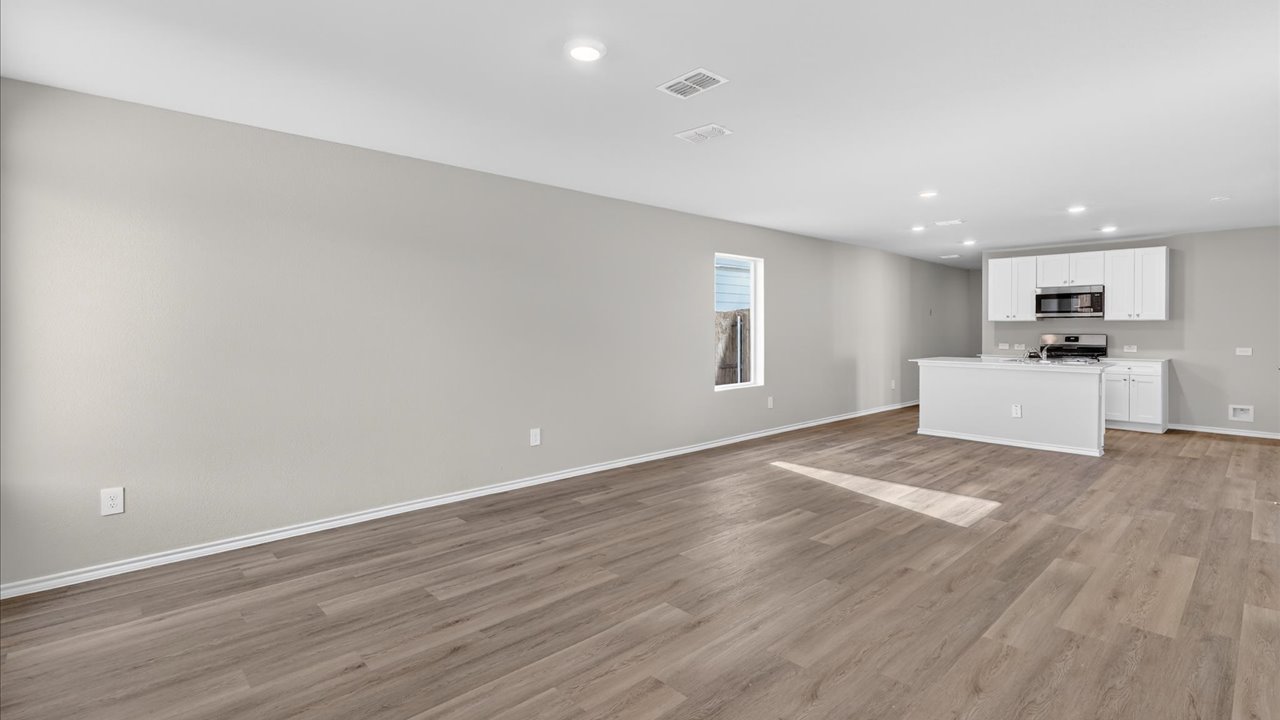 Open concept kitchen, living, and dining space