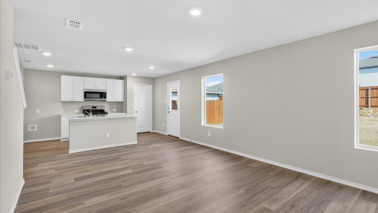 Open concept kitchen, living, family, and dining room space