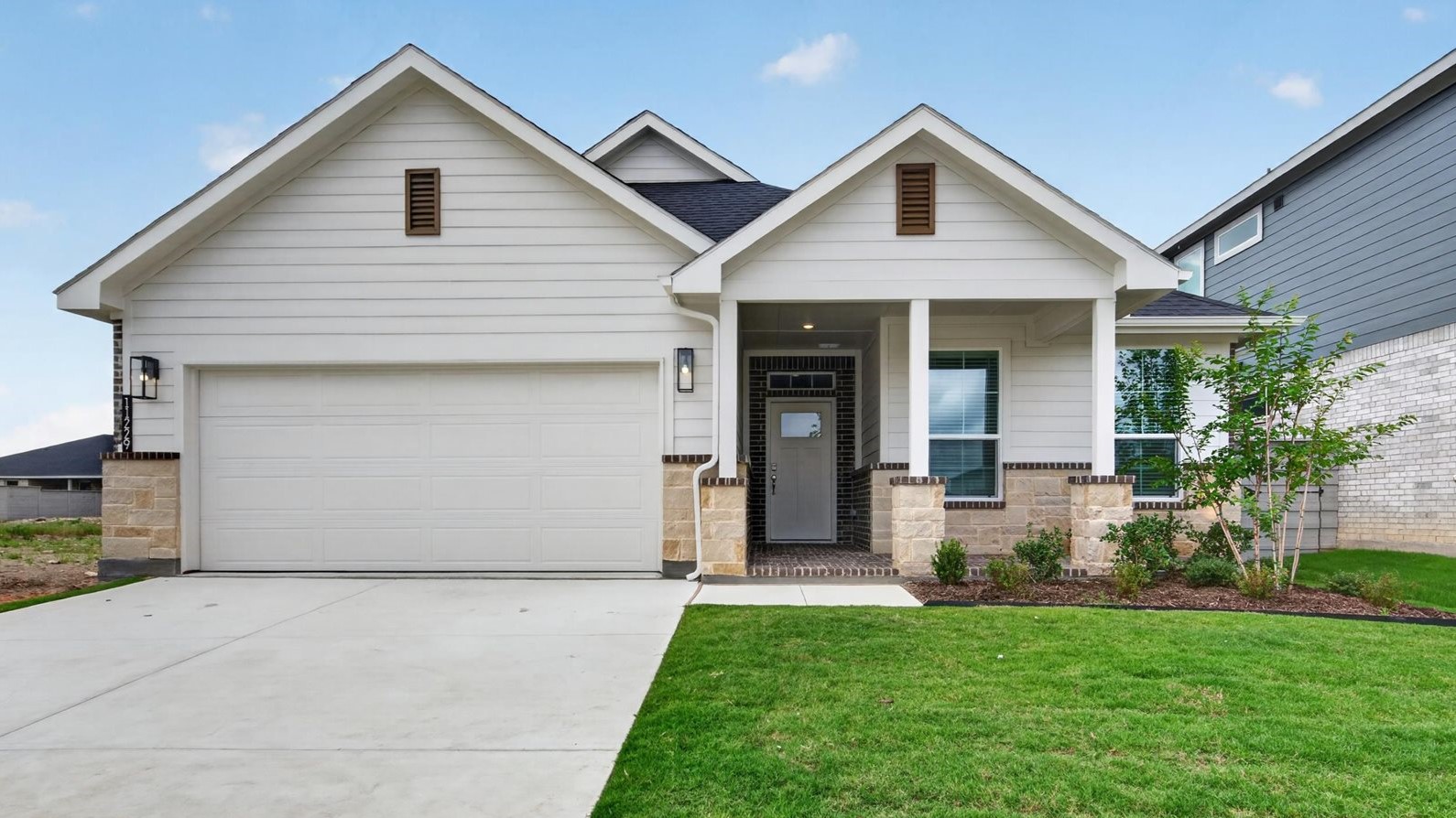 Exterior of Basswood single story home