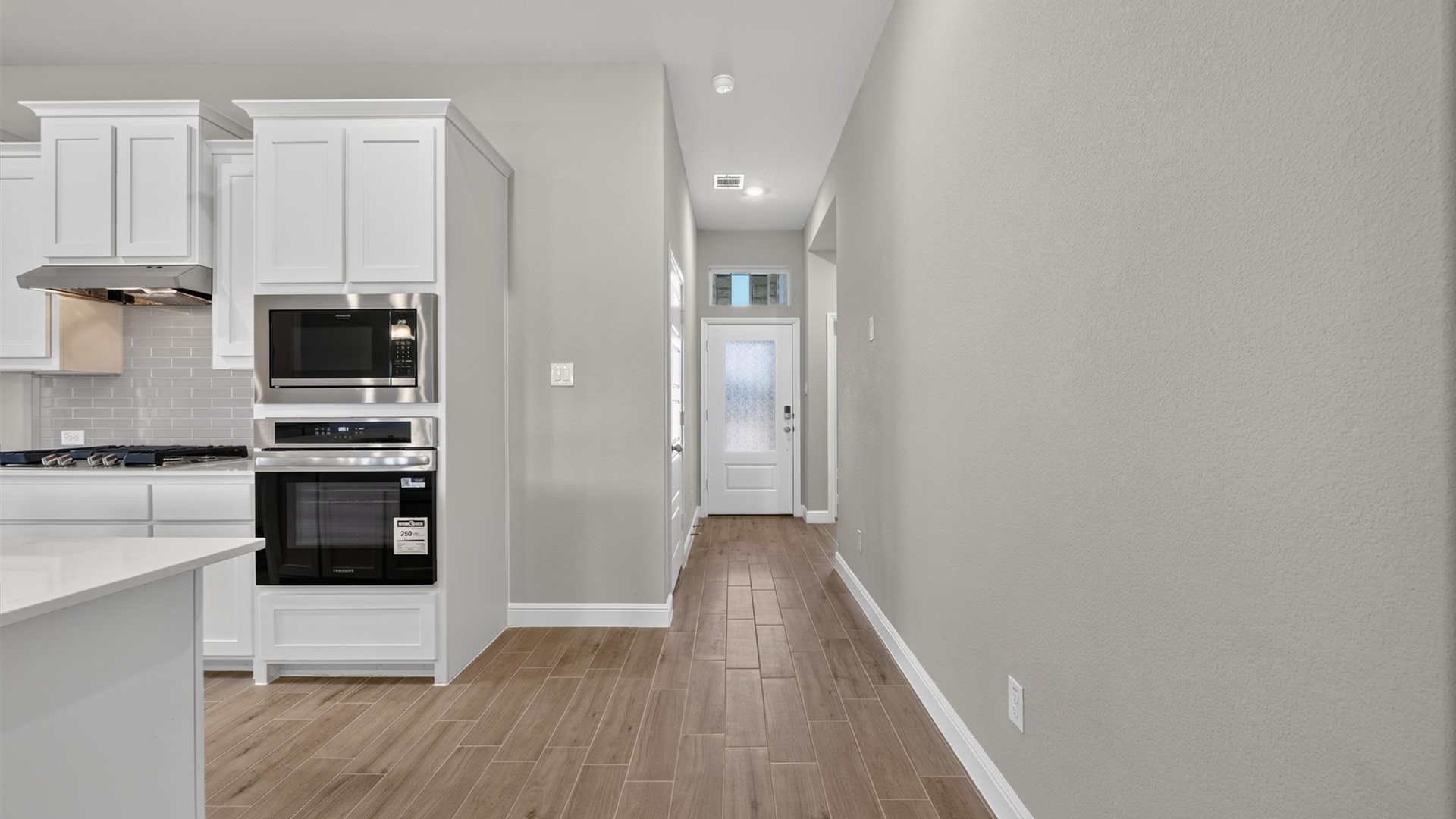 Front entry and hall leading to living areas