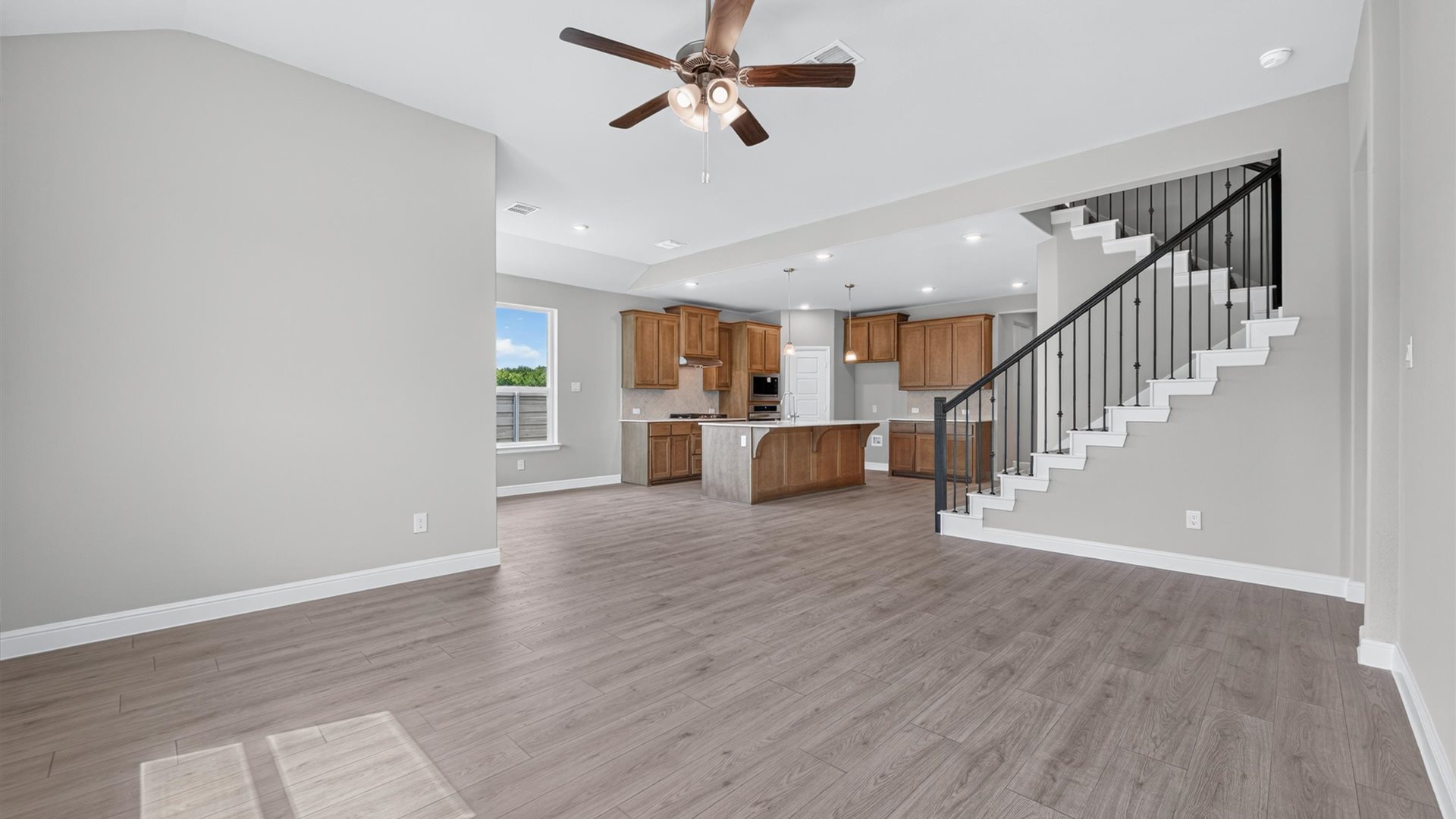 Spacious open concept kitchen, dining, and living